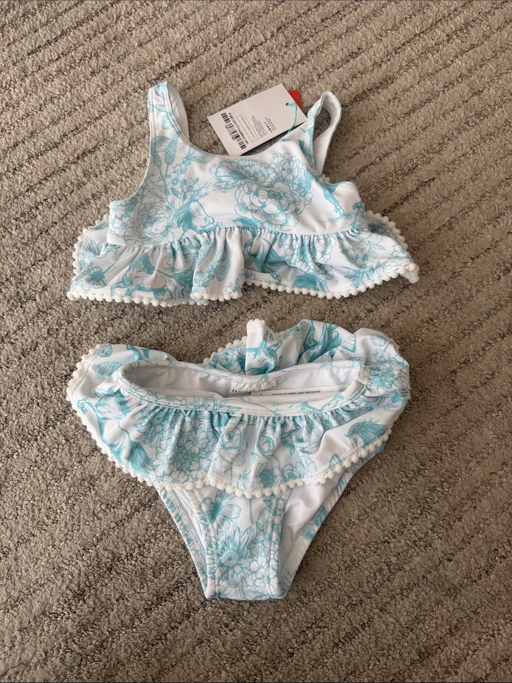Posh Peanut. Two-Piece Ruffle Floral Swim Set in White & Light Blue